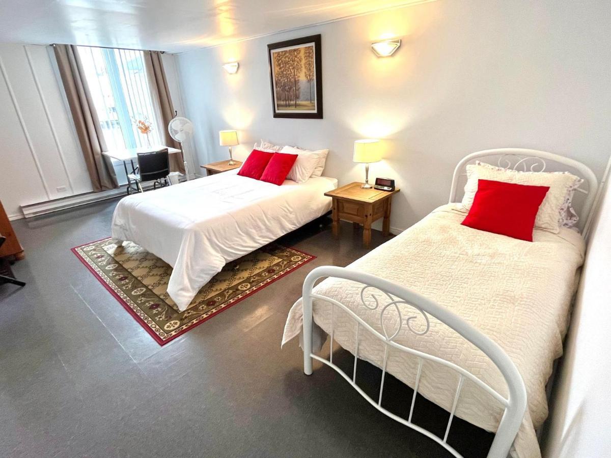 Les Appartements Du Vieil Edifice Metabetchouan Екстериор снимка